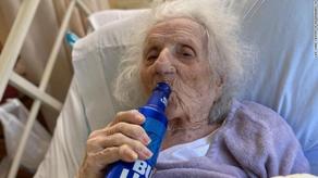 103-year-old woman downs chilled beer to celebrate recovery from COVID-19 - PHOTO