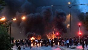 A massive riot after burning Koran