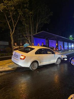 Car crashes into bus stop in Vake