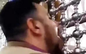 People from Iran are kissing shrines to protect themselves from coronavirus - VIDEO