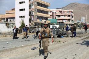 Two blasts killed 13 in Afghanistan