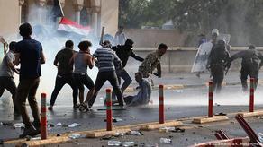 Clashes between the police and protesters in Baghdad