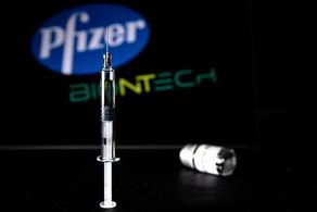 Pfizer halves COVID-19 vaccine production