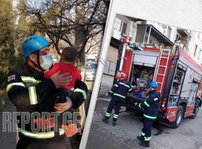 Rescuers pull children out of the burning building - PHOTO