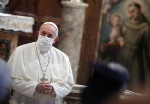 Pope wears mask for first time at public event